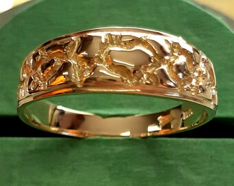 Solid 10K gold nuggets ring custom made to fit your finger .
