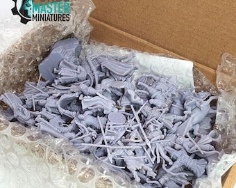 May include: A box filled with unpainted gray plastic miniature figures of warriors and horses. The box is lined with bubble wrap for protection during shipping. The box has a label that says "FORGE MASTER MINIATURES".