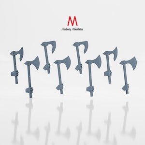 Może przedstawiać: Osiem miniaturowych szarych siekier z czarnymi trzonkami. Siekiery są ułożone w półkole na białym tle.