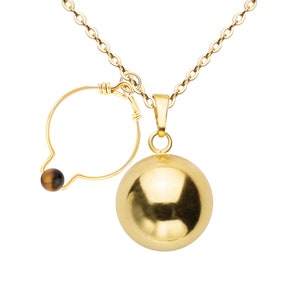 Schwangerschafts-Bola und Tigerauge-Ring
