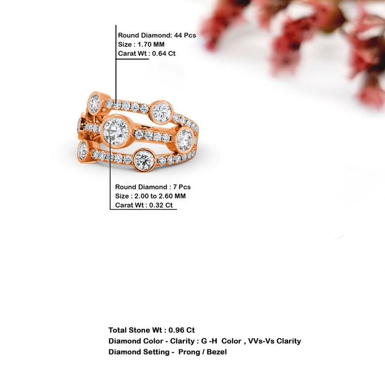 May include: A rose gold ring with a multi-row design featuring round diamonds. The ring has a total of 44 round diamonds with a total carat weight of 0.96 carats. The diamonds are set in a prong and bezel setting. The diamonds are G-H color and VVS-Vs clarity.