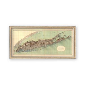 Framed Map of 1913 Long Island Map, Long Island Map in a minimalist hallway, proving vintage maps fit any decor style with its clean lines and striking visual contrast.