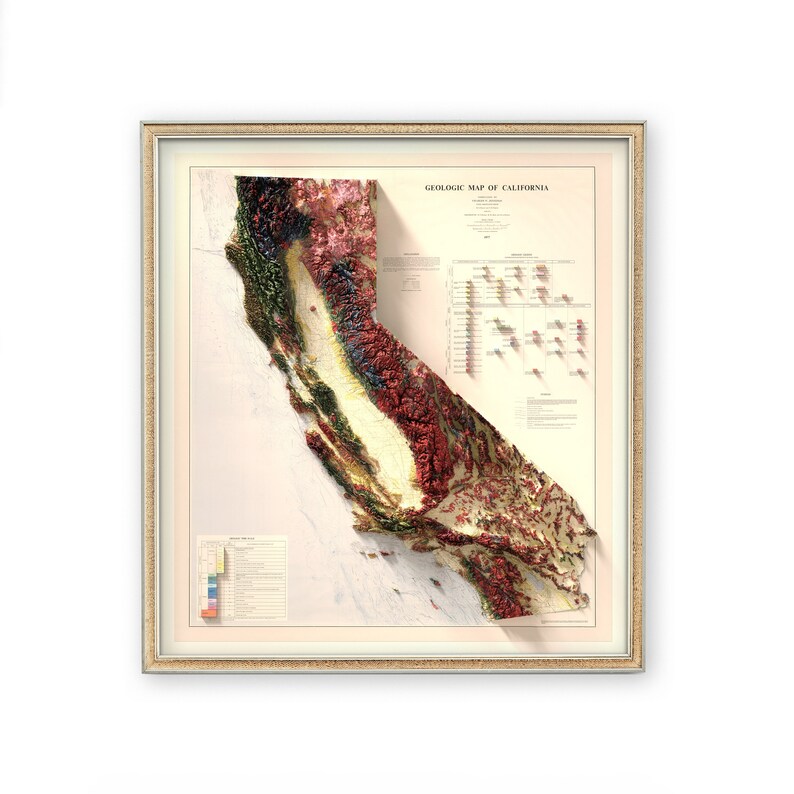 May include: A framed 3D relief map of California, displaying the state's geological features. The map uses a variety of colours to represent different geological formations. The title "Geologic Map of California" is visible.