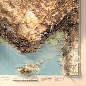 May include: A detailed topographic map of Cyprus, showing the island's terrain, coastline, and major cities. The map uses a color gradient to represent elevation, with green for lower elevations and brown for higher elevations. The map also includes labels for cities, towns, and other geographic features.