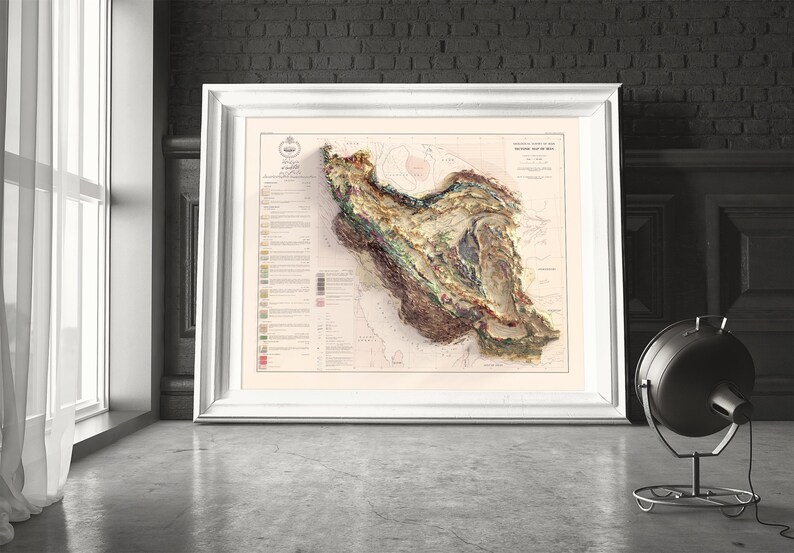 May include: A vintage map of Iran, depicting the country's topography and geological features. The map is printed in shades of brown, green, and blue, and includes a key with different colours representing different types of terrain.