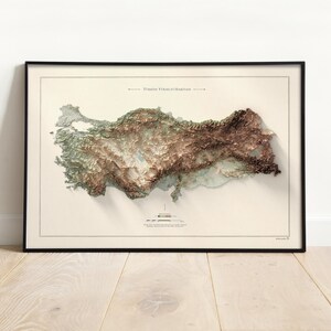 May include: A framed topographic map of Turkey with a 3D effect, showing the country's terrain in shades of green, brown, and blue. The map is titled "Turkey Topographic Relief".