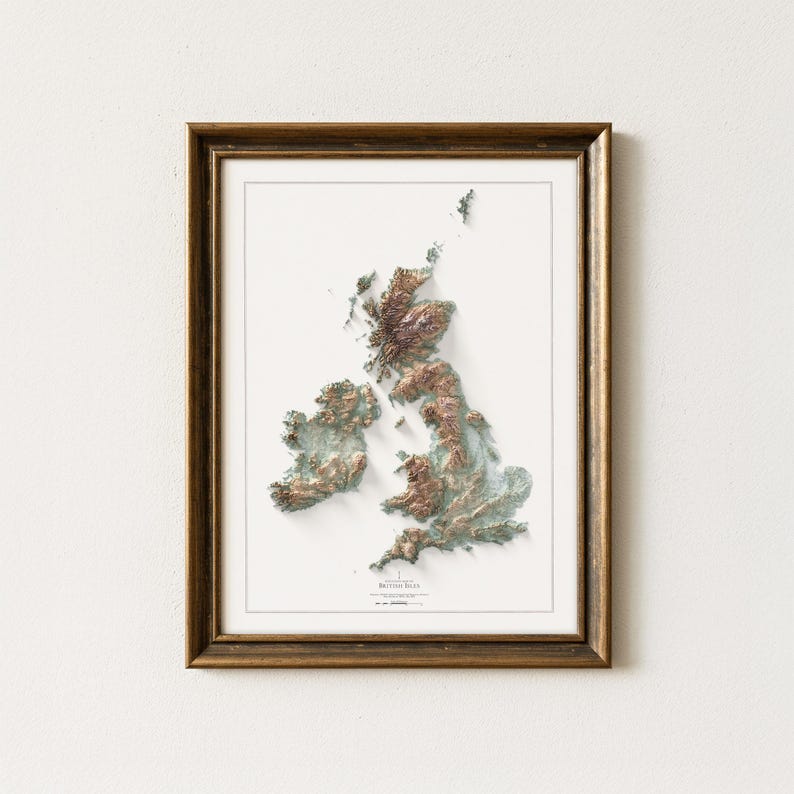 May include: Framed relief map of the British Isles, featuring detailed topographical features in shades of brown and green. The map is set against a white background and encased in a gold-toned wooden frame, creating a classic aesthetic.