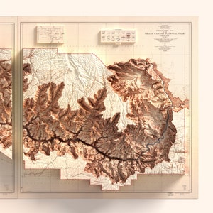 May include: A topographic map of Grand Canyon National Park, Arizona, in shades of brown and beige. The map shows the canyon's relief with detailed contours and the text "TOPOGRAPHIC MAP GRAND CANYON NATIONAL PARK ARIZONA".