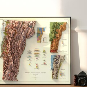 K&ouml;nnte beinhalten: Eine Vintage-geologische Karte von Vermont mit einem 3D-Relief-Effekt. Die Karte ist in Abschnitte unterteilt, die jeweils eine andere geologische Formation darstellen. Die Karte ist in einem schwarzen Rahmen gerahmt und auf einer Holzoberfl&auml;che ausgestellt.