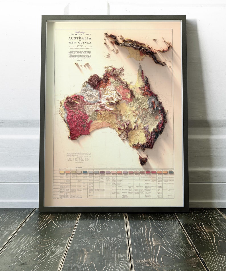 May include: A vintage geological map of Australia and New Guinea, showing the different rock formations and geological features of the region. The map is printed in a variety of colors and includes a legend with a key to the different rock types.