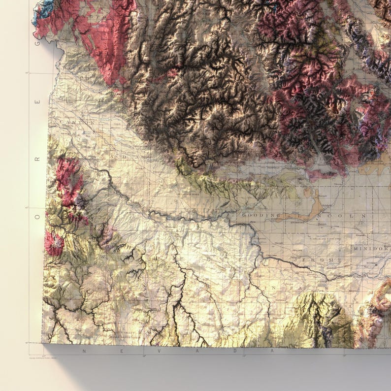 May include: A detailed, vintage-style map with topographic features. The map displays a relief of mountains and valleys in shades of brown, pink, and green. The map has a weathered appearance, with grid lines and text labels.