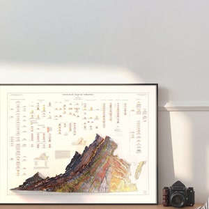 May include: A framed geological map of Virginia, showing the state's diverse rock formations and geological history. The map is in a black frame and features a detailed color-coded key.