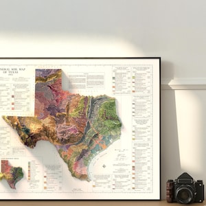May include: A vintage-style map of Texas showing the general soil types. The map is printed on white paper and framed in a black frame. The map is titled "General Soil Map of Texas 1913".