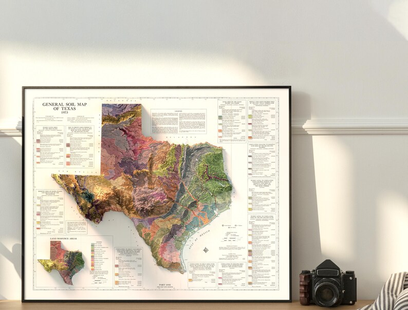 May include: A vintage-style map of Texas showing the general soil types. The map is printed on white paper and framed in a black frame. The map is titled "General Soil Map of Texas 1913".