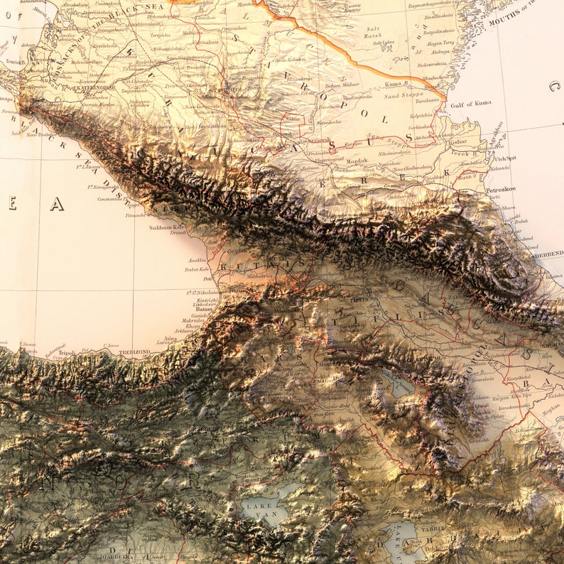May include: A vintage map of the Caucasus region, showing the borders of Russia, Turkey, and Persia. The map is detailed and includes mountains, rivers, and cities. The map is printed on a cream-colored paper with brown and red lines.