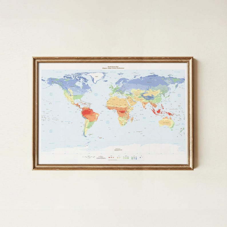 May include: A framed world climate map displaying the K&ouml;ppen-Geiger climate classification system. The map features a light blue ocean background with landmasses color-coded in shades of red, orange, yellow, green, and blue to represent zones.