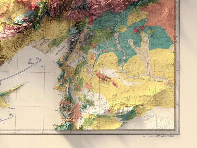 May include: A vintage map of a coastal region showing detailed geological formations. The map is in shades of yellow, green, red, and blue, with a grid overlay. The map includes text in Arabic.