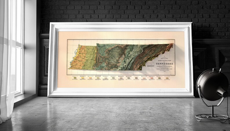 May include: A vintage, framed map of Tennessee with a relief-style design. The map is printed in shades of green, brown, and yellow, and shows the state's topography. The title "Geological Map of Tennessee" is printed in the lower right corner.