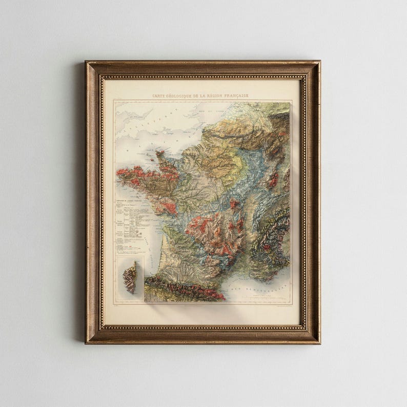 May include: Framed vintage geological map of France, featuring a detailed relief and color-coded representation of the country's terrain. The map is encased in a gold-toned wooden frame, adding a classic aesthetic.