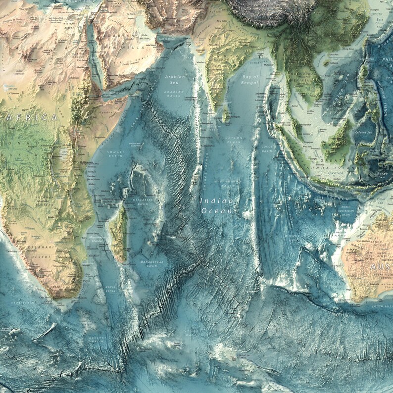 May include: A detailed physical map of the Indian Ocean region, showcasing the bathymetry of the ocean floor in shades of blue and the surrounding continents of Africa, Asia, and Australia in earthy tones of green, tan, and brown.