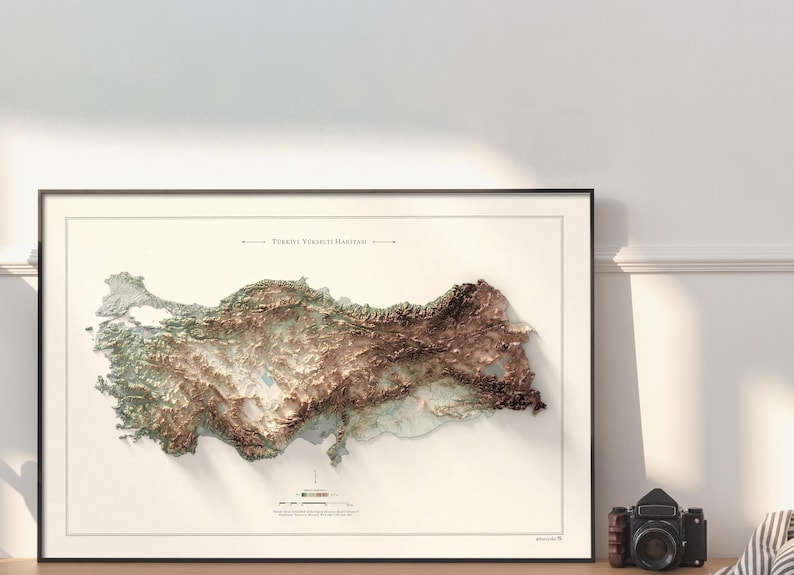 May include: A framed map of Turkey with a 3D topographic relief showing the country's terrain. The map is titled "T&uuml;rkiye Y&uuml;kseklik Haritası" in Turkish, which translates to "Turkey Elevation Map".