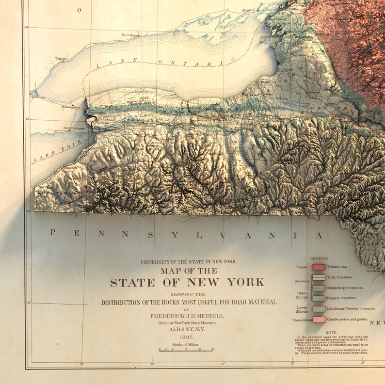 May include: A vintage map of New York State, showing the distribution of rocks for road material. The map, from 1897, features detailed relief shading and text including the names of the Great Lakes and the legend. The map is in shades of beige, brown, and blue.