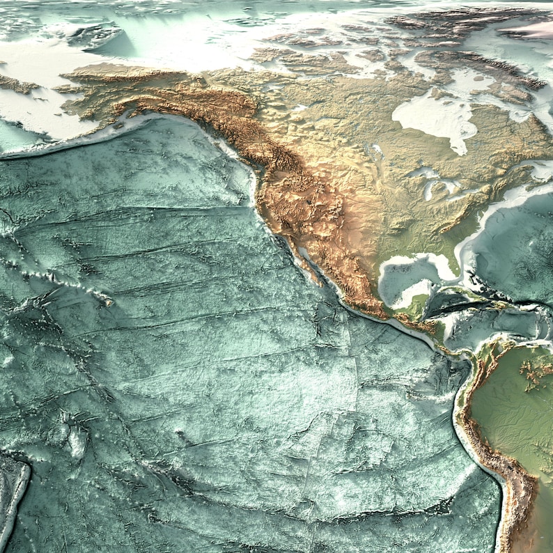 May include: A close-up view of a topographic map of North America, showing the western coast of the continent and the Pacific Ocean. The map is rendered in shades of green, brown, and white, with the ocean depicted in a deep blue.