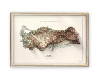 May include: A framed map of Turkey with a 3D relief showing the country's topography. The map is printed on a cream-coloured background with a brown frame. The title "Türkiye Yükseklik Haritası" is printed at the top of the map.