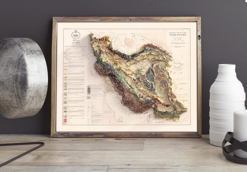 May include: A vintage-style, framed map of Iran with a 3D relief design. The map is printed on cream-coloured paper with brown, green, and beige colours. The map is titled "Geological Map of Iran" and includes a legend with geological information.