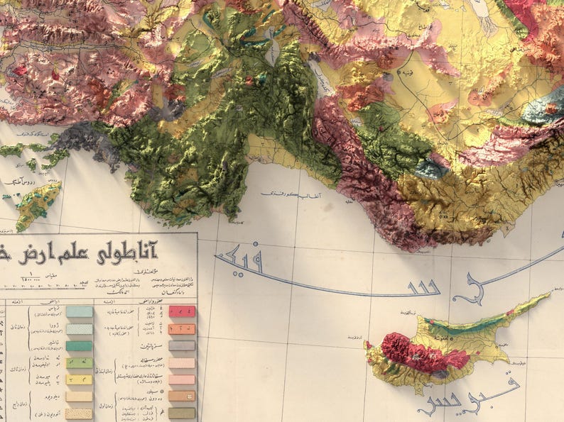 May include: A vintage map of the Mediterranean Sea with a detailed colour-coded key showing different geological formations. The map is titled "Atlas of Geological Formations" in Arabic. The map shows the island of Cyprus in the bottom right corner.