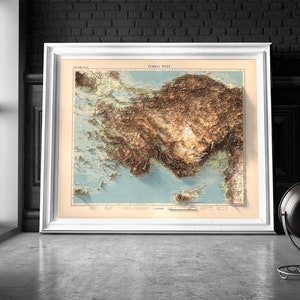 May include: A framed vintage map of Turkey with a 3D relief effect, showing the country's topography with brown and green hues. The map is titled "TURKEY WEST" and is surrounded by a white frame.