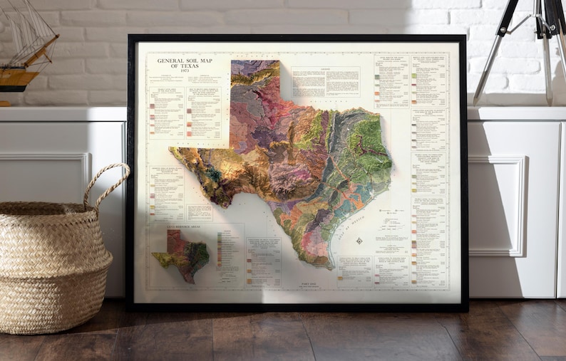 May include: A vintage framed map of Texas showing the general soil map of the state. The map is in a black frame and has a white background with a detailed illustration of the state's soil types. The map is titled "General Soil Map of Texas 1912".