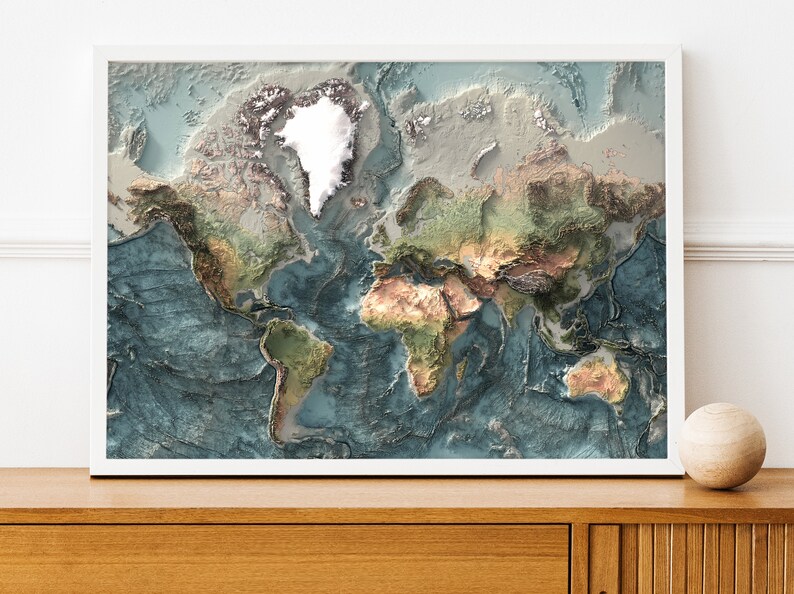 May include: A framed world map with a 3D effect, showing the continents in shades of green, brown, and blue. The oceans are a deep blue, and the map is framed in white.