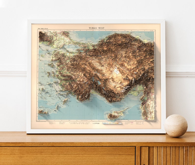 May include: A vintage-style relief map of Turkey West, showing the topography of the region in brown and green hues. The map is framed in white and has the title "TURKEY WEST" at the top.