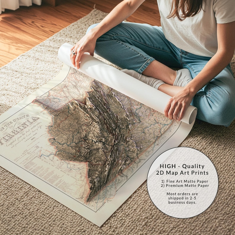 May include: A detailed map art print of Virginia, with a 3D relief effect. The map is printed on matte paper and is being unrolled. The image includes text that says "HIGH - Quality 2D Map Art Prints".