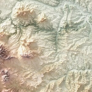 May include: A detailed, textured topographic map with a color palette of beige, brown, and green. The map depicts a mountainous region with valleys and ridges, showcasing the elevation changes. The overall effect is a 3D-like representation of the terrain.