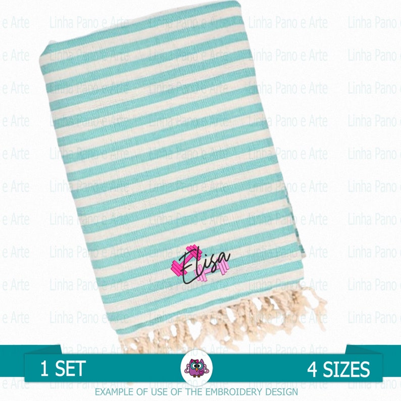 May include: A turquoise and white striped beach towel with a fringe border. The towel has the name "Elisa" embroidered on it in pink and black.