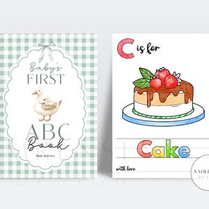 May include: Two educational book pages featuring a light green gingham cover with a duck illustration and the text Baby's FIRST ABC Book, and a white page with a watercolor cake illustration, the text C is for Cake, and a writing practice line.