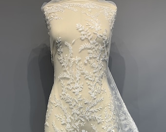 High quality off white floral embroidered lace with transparent sequins and beads for wedding dress