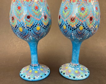 Blue Speckled Hand Made and Painted Ceramic Wine Glasses with Pink, Red, Purple, and Yellow Wrap Around Mandala