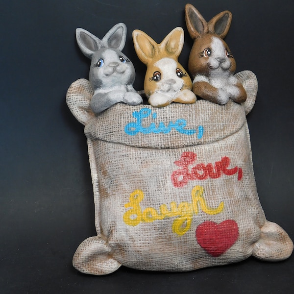 Three Bunnies In a Burlap Sack with Live, Laugh, Love on the Sack Hand Made and Painted Ceramic Wall Décor