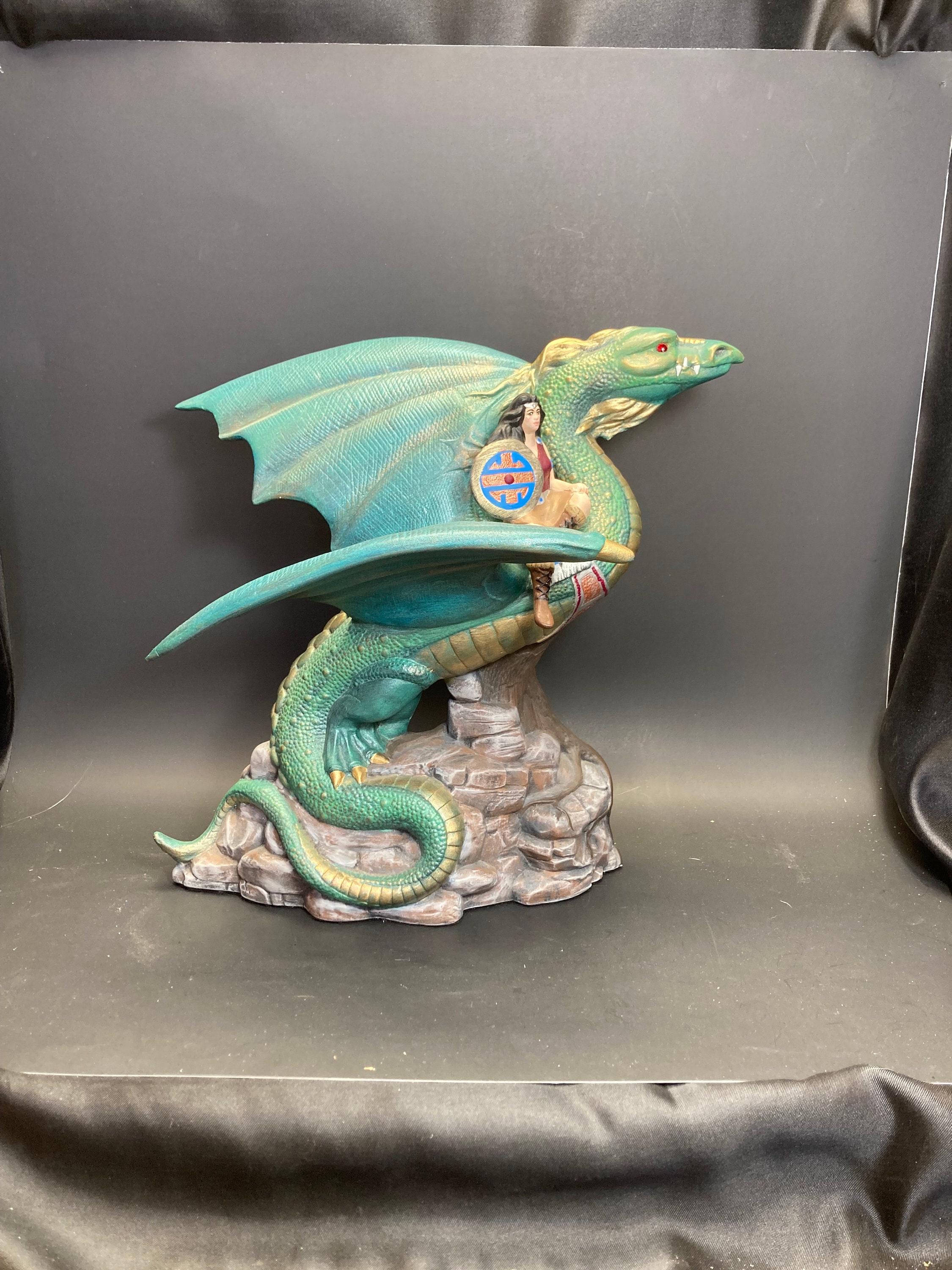 Protector of Innocence Dragon With Woman Warrior Riding Hand