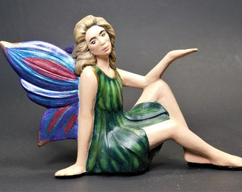 Pixie Fairy Sitting with Crystal in Her Hand Hand Made and Painted Ceramic Figurine