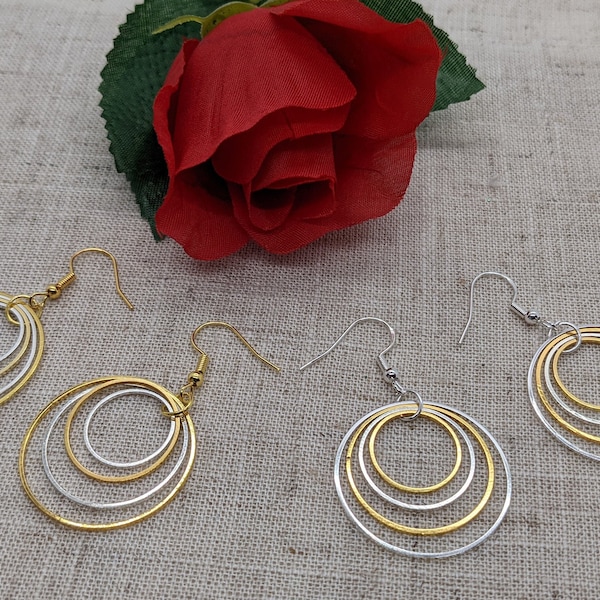 40th birthday earrings; four silver and gold hoops, one for each decade. hoop earrings, handmade jewelry, minimalist