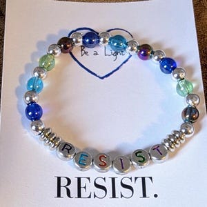 Resist bracelet, human rights, dissent,  pro-equity, empowerment,  democracy,  protest, FDT, stackable, glass beads, stretch bracelet,