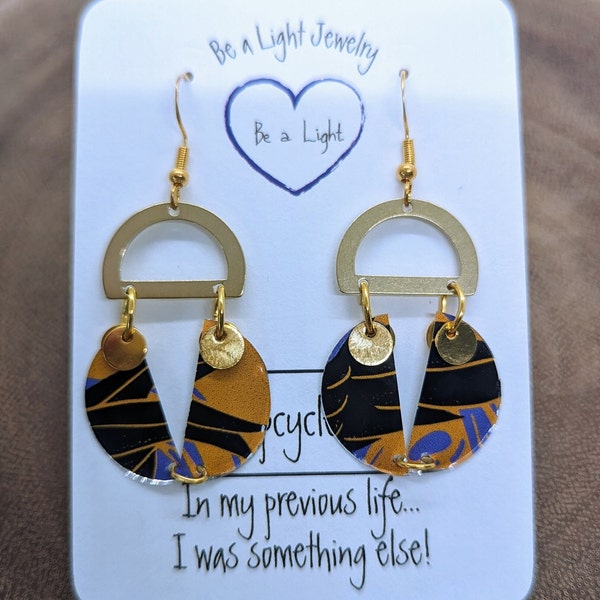 Asymmetrical earrings, unique V-shaped style, up-cycled, echo-friendly gift, gold and purple accents on black feather motif.