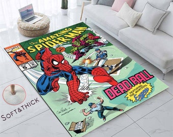 May include: A green, red, and blue area rug featuring a comic book illustration of Spider-Man swinging from a web with the text "The Amazing Spider-Man" and "Dead Ball" printed on the rug.