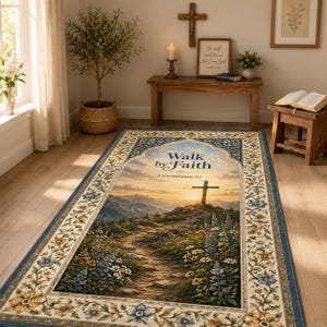May include: A rectangular area rug featuring a landscape scene of a mountain path leading to a cross at sunset. The text Walk by Faith 2 Corinthians 5:7 is printed in the centre. The rug has a blue and cream floral border with yellow accents.