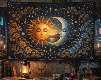 May include: A celestial tapestry featuring a sun and moon design with floral accents. The sun is golden, and the moon is blue, set against a dark blue background with stars. The tapestry is displayed above a wooden table with books and a lantern.