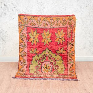 Alfombra marroquí Dhurrie: Estampado floral, tonos tierra, tamaño pequeño